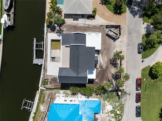 drone / aerial view with a water view