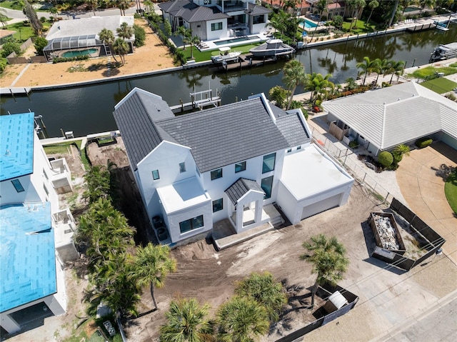 bird's eye view with a water view