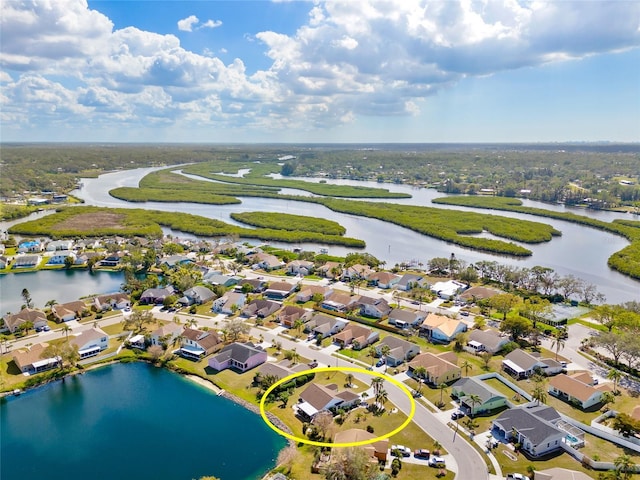 aerial view featuring a water view