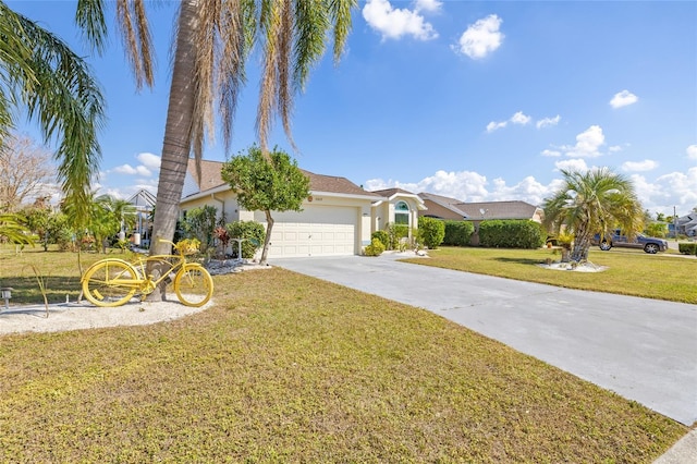 ranch-style home with a garage and a front yard