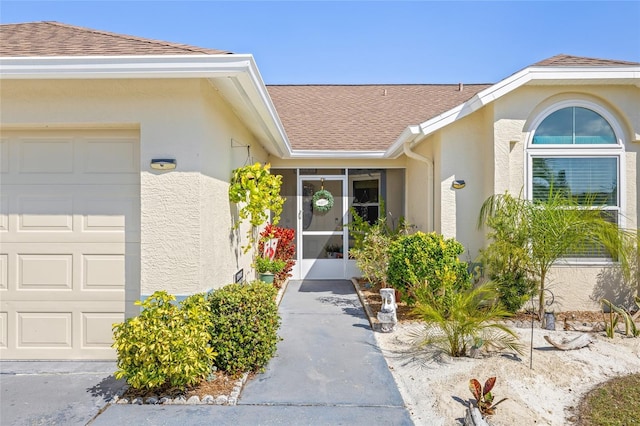 entrance to property featuring a garage