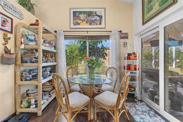 dining area with hardwood / wood-style flooring