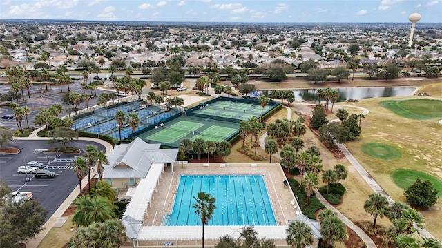 bird's eye view with a water view