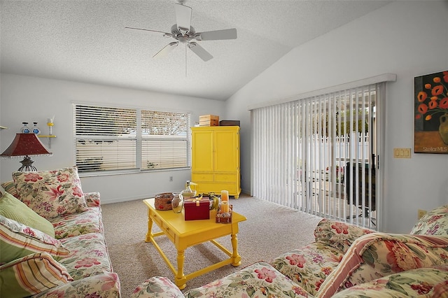 living room featuring carpet floors, vaulted ceiling, and plenty of natural light