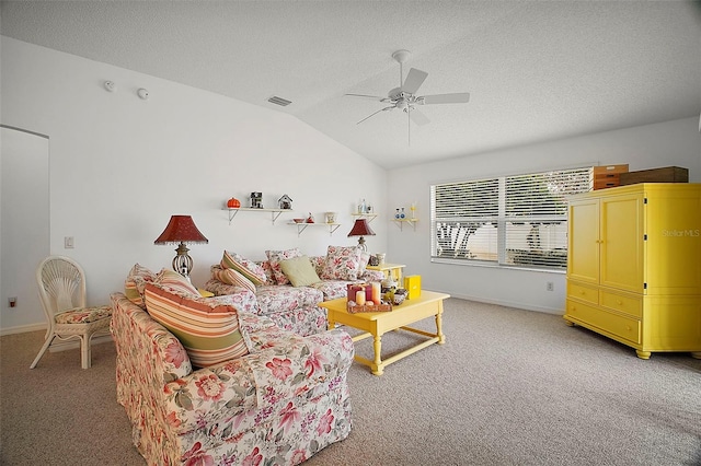 game room featuring ceiling fan, lofted ceiling, carpet floors, and a textured ceiling