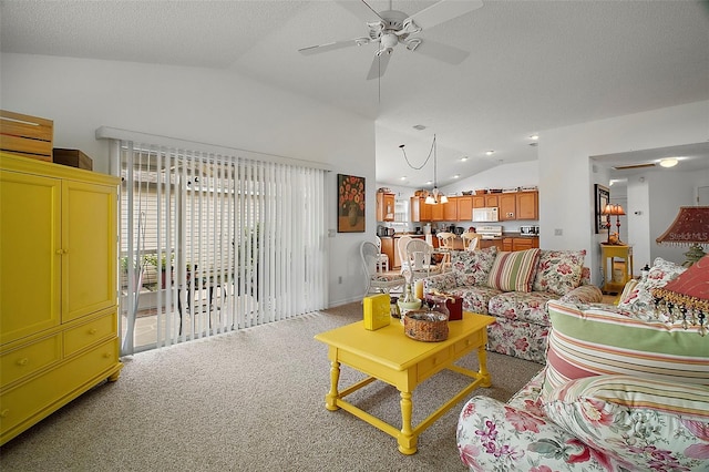 carpeted living room with lofted ceiling, ceiling fan with notable chandelier, and a textured ceiling