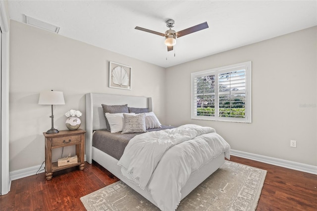 bedroom featuring dark wood-type flooring and ceiling fan