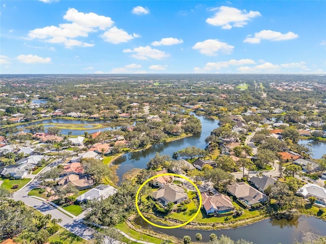 drone / aerial view with a water view