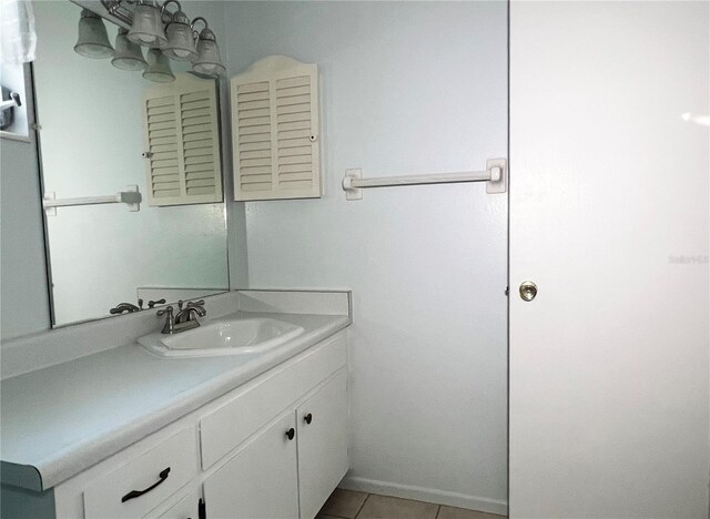 bathroom with vanity and tile patterned floors