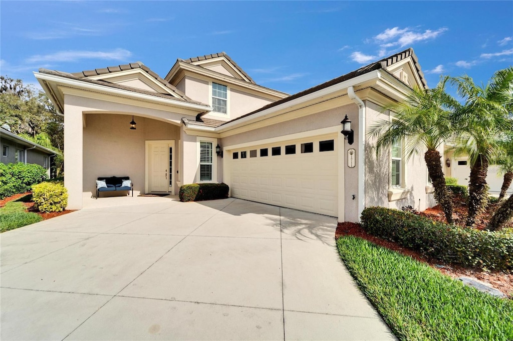 view of front of property with a garage