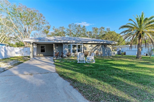 single story home with a carport and a front yard