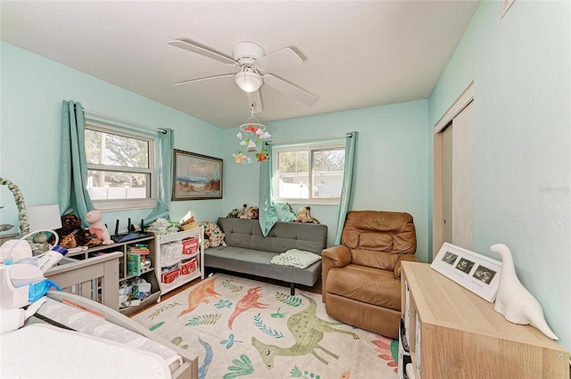 living room with ceiling fan