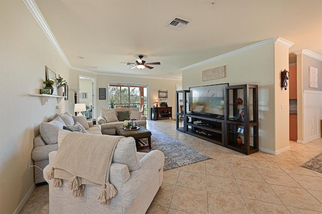 tiled living room featuring ceiling fan and ornamental molding