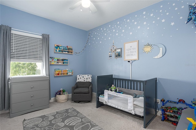 carpeted bedroom with ceiling fan