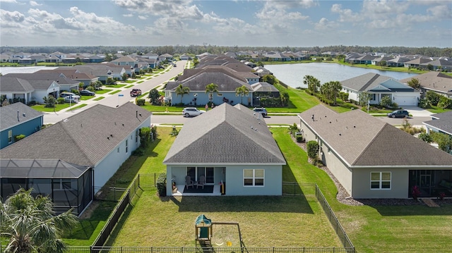 drone / aerial view with a water view