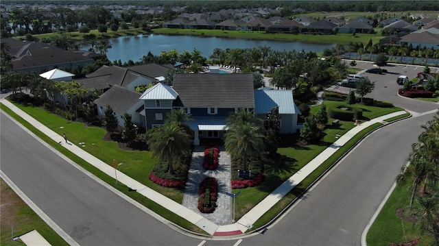 drone / aerial view featuring a water view