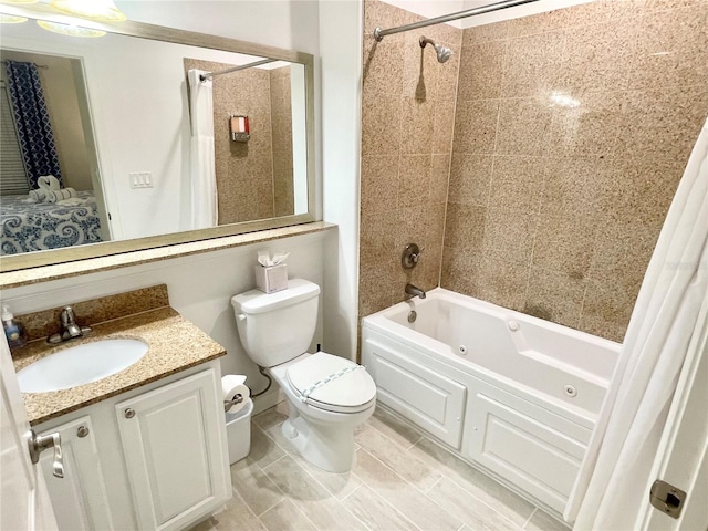 bathroom featuring toilet, connected bathroom, shower / tub combo with curtain, and vanity