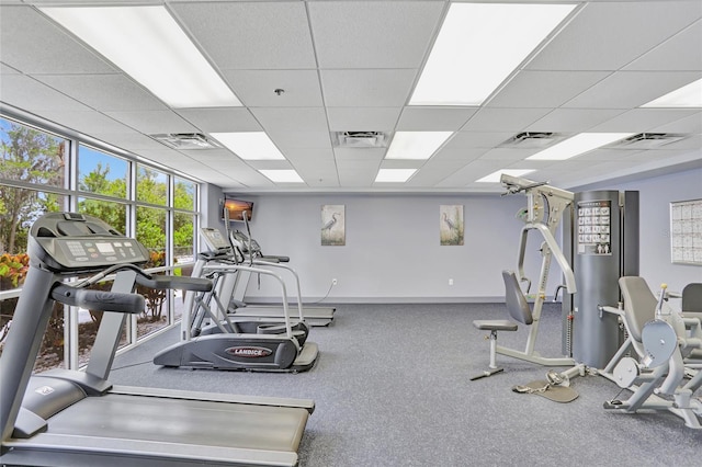 gym with visible vents and a drop ceiling