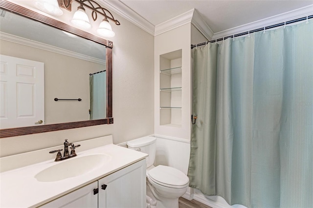 bathroom with a shower with shower curtain, toilet, vanity, and ornamental molding