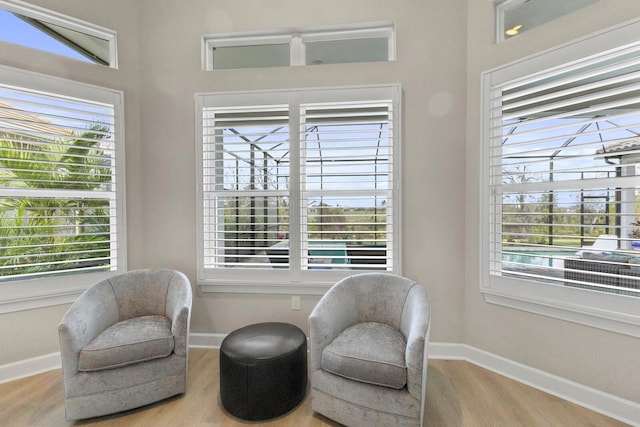 sitting room with light hardwood / wood-style floors