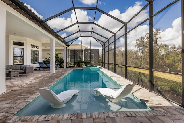 view of swimming pool with an outdoor living space, glass enclosure, and a patio area