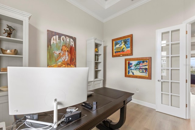 office space featuring ornamental molding and light hardwood / wood-style flooring