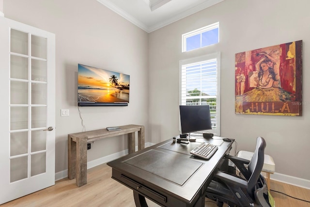 office featuring ornamental molding and light hardwood / wood-style floors