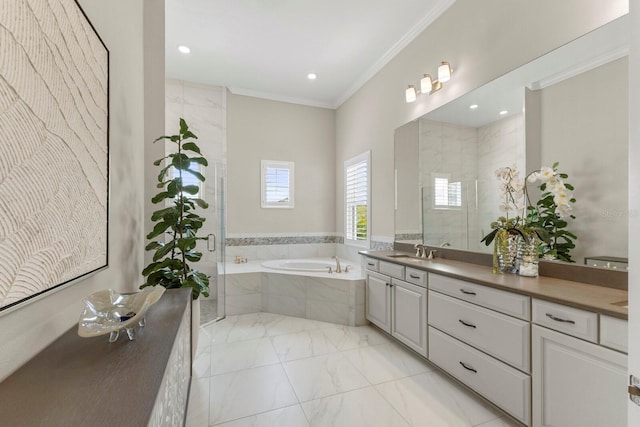 bathroom with ornamental molding, shower with separate bathtub, and vanity