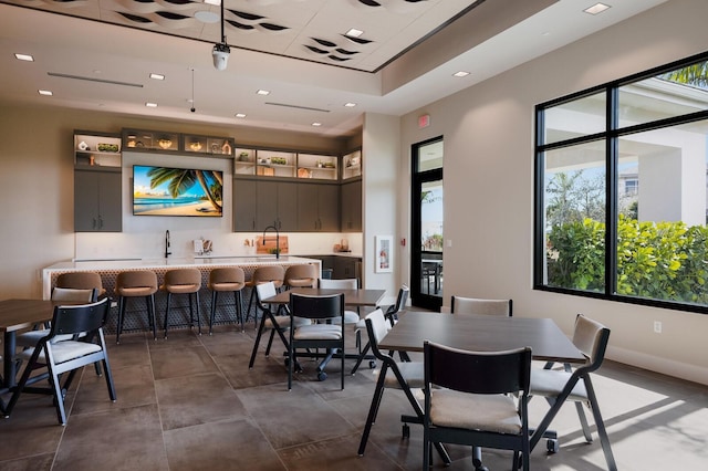 dining space featuring wet bar