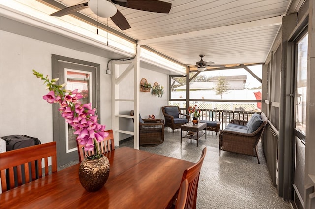 sunroom / solarium with ceiling fan