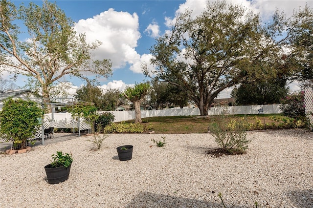 view of yard featuring fence