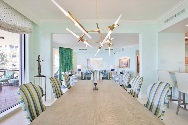 dining room with visible vents, an inviting chandelier, and ornamental molding