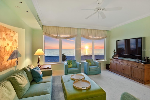 living room with light carpet, baseboards, crown molding, and ceiling fan