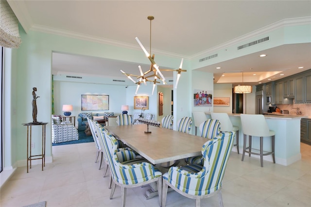 dining area featuring visible vents, recessed lighting, crown molding, and an inviting chandelier