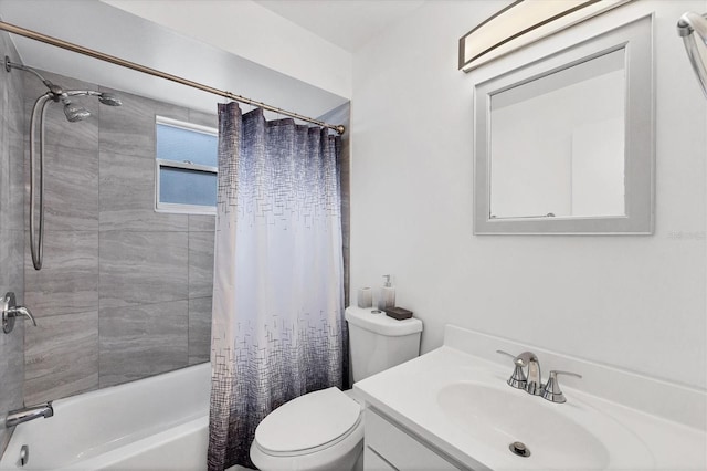 full bathroom featuring vanity, shower / tub combo with curtain, and toilet