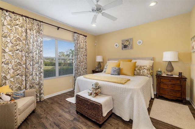 bedroom featuring ceiling fan and dark hardwood / wood-style floors