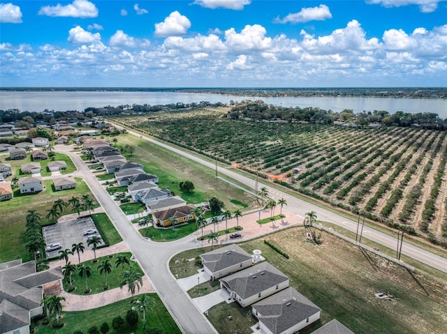 drone / aerial view featuring a rural view and a water view