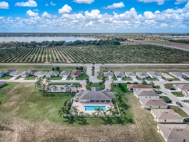 bird's eye view with a rural view and a water view