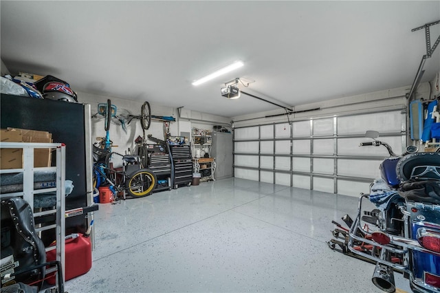 garage featuring a garage door opener