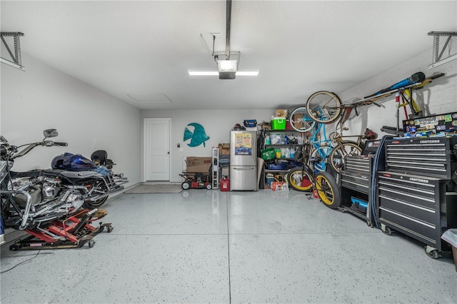 garage featuring a garage door opener