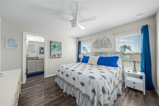 bedroom featuring ceiling fan, dark hardwood / wood-style flooring, and ensuite bath