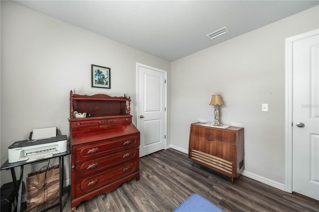 miscellaneous room featuring dark hardwood / wood-style floors