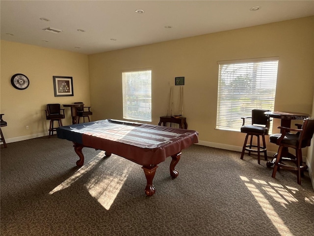 rec room with carpet floors, a healthy amount of sunlight, and baseboards