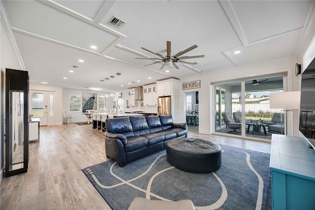 432 W Gate Dr, Venice, FL 34285 - living area with light wood-type flooring, visible vents, recessed lighting, ceiling fan, and baseboards