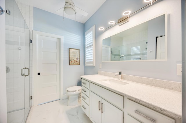 432 W Gate Dr, Venice, FL 34285 - full bath with toilet, a stall shower, a ceiling fan, marble finish floor, and vanity