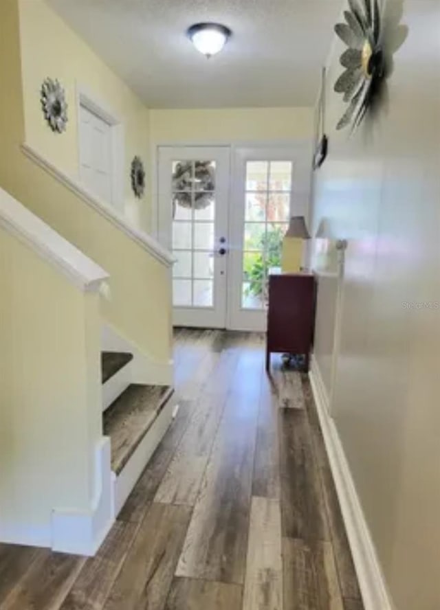 doorway featuring dark hardwood / wood-style flooring