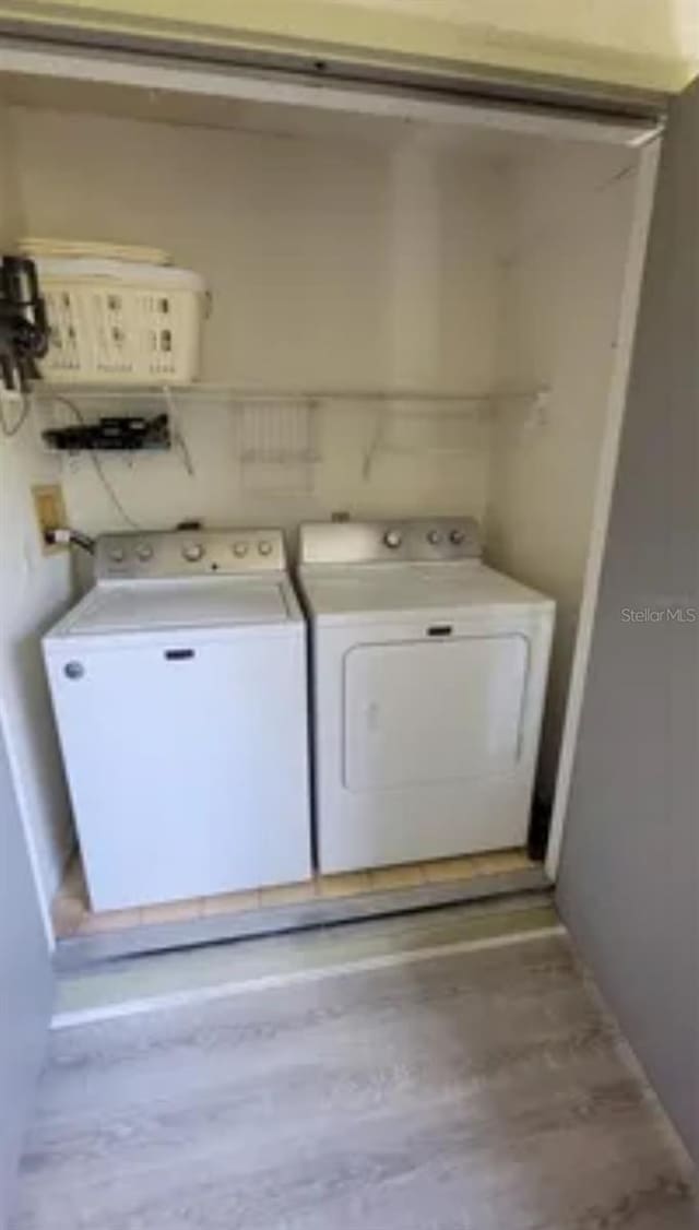 laundry area featuring washer and clothes dryer