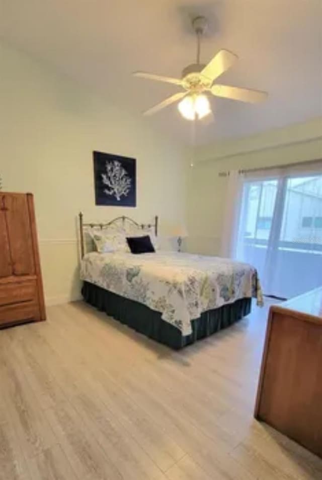 bedroom featuring wood-type flooring and ceiling fan