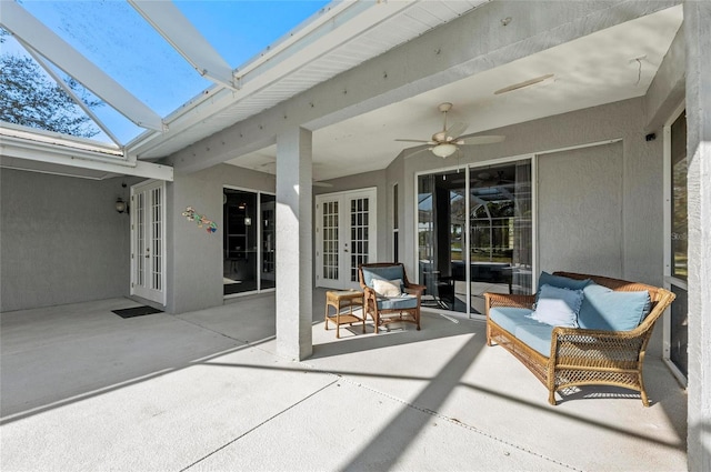 view of patio with french doors, ceiling fan, and outdoor lounge area