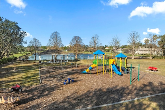 view of play area with a water view